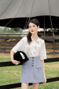 Dịu dàng với chân váy A 2 túi ốp trước